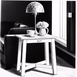 a room with a couch and a table with a lamp on it