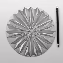a silver paper clock, pen and a black marker