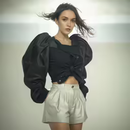 an image of woman that is posing with her hair in the wind