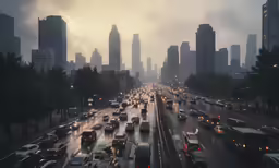 several cars are driving in traffic on an overcast day