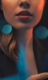 a woman with blue polka dots is making a face