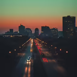 some cars lights and street lights in the city
