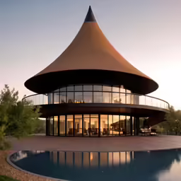 an unusual building with large circular pool area