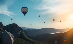 there are many balloons flying in the air