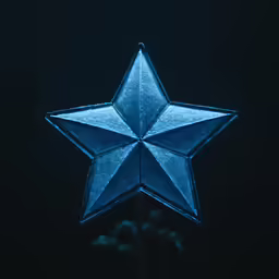 a large blue lighted star on a tree
