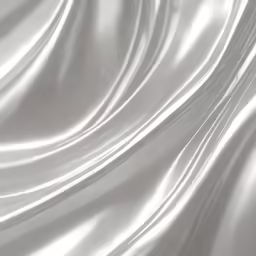 a silver background with rippled light fabric