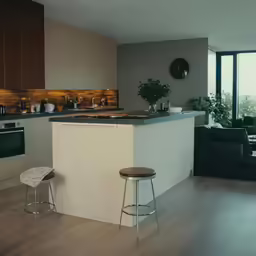 a very nice looking kitchen with an island
