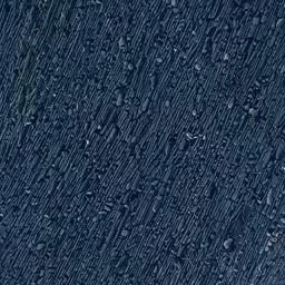 an overlaid blue area with rocks, grass and water droplets