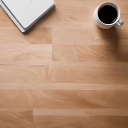 a coffee cup and an empty notebook