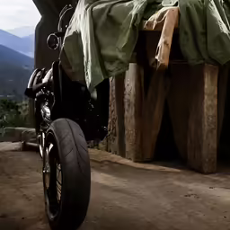 a parked motorcycle with its back tire down