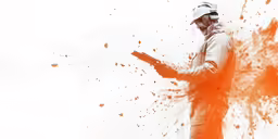a man is standing holding a gun with an orange spray behind him