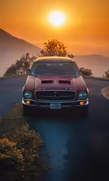 a red muscle mustang in a mountainous road