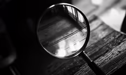 a magnifying glass on top of a table