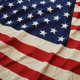 two big flags of the united states are shown together