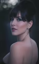 the woman has very dark hair and is wearing a black dress
