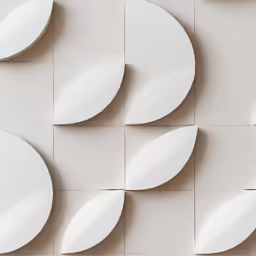 a 3d wall made out of small white circles and leaves