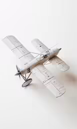 a model airplane with propellers on a white background