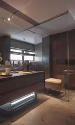 an open bathroom with a glass wall and sink