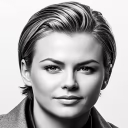 a black and white photo of a woman with short hair