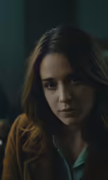 a close up of a person with long hair
