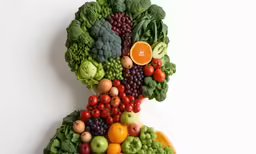 an image of a man made up of vegetables and fruits