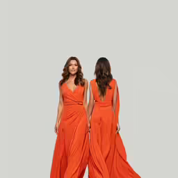 two women wearing orange dresses in the middle of two poses