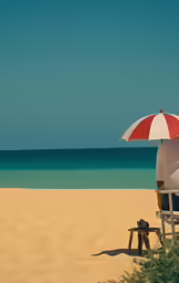 an umbrella sits on top of a chair at the beach