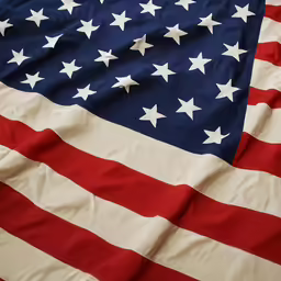 an american flag that is laying flat