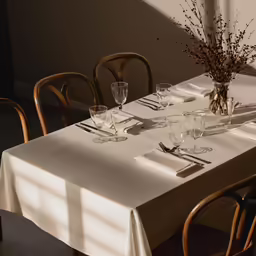 an empty table in a dimly lit room