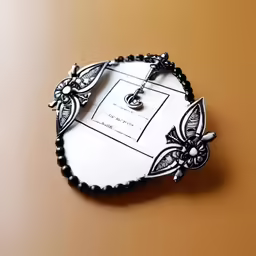 a jewelry box is shown with a tag attached to it