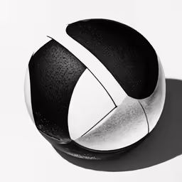 a volley ball that is laying down in the sun