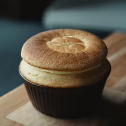 a two layer chocolate cupcake on a plate
