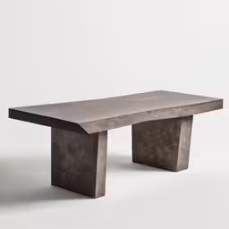 a cement bench with no legs in front of a white background