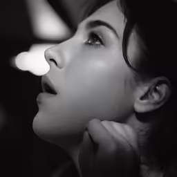 black and white photograph of woman with eyeliner