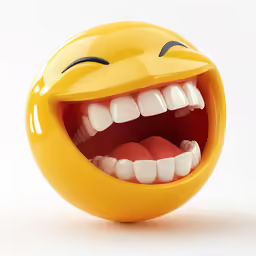 a yellow plastic ball has its teeth and mouth wide open