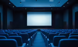 a view of an empty auditorium from the back row