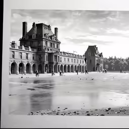 an old photo shows the building in black and white