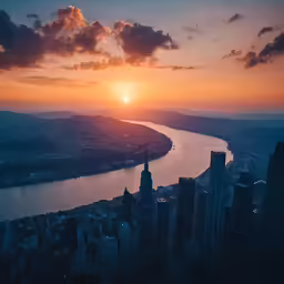 a view of a lake and a city from the top of a building