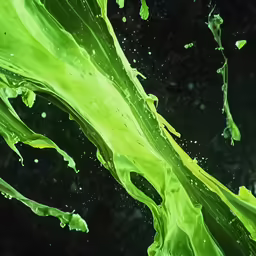 green juice flowing in the dark to reveal its contents