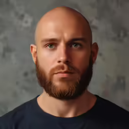 an image of a bearded man wearing a shirt
