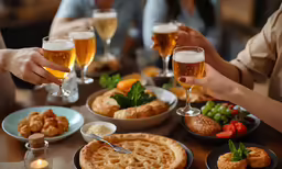 there are many food and beer on the table