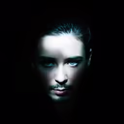 a man with a beard and blue eyes