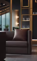 a black and brown leather chair in front of the window