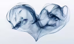 a couple kissing with the faces behind them