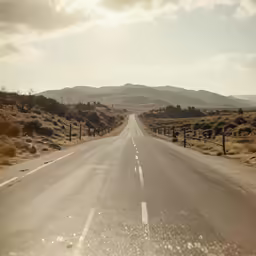 this is an image of the empty road in the desert