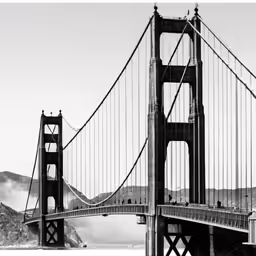 a long bridge spans across the water