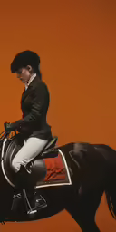 the painting shows a woman riding a horse
