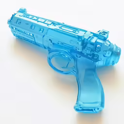 the blue gun is shaped like a lego gun