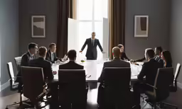 a man standing in the middle of a large conference room