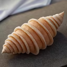 a pastry is made into a large cone